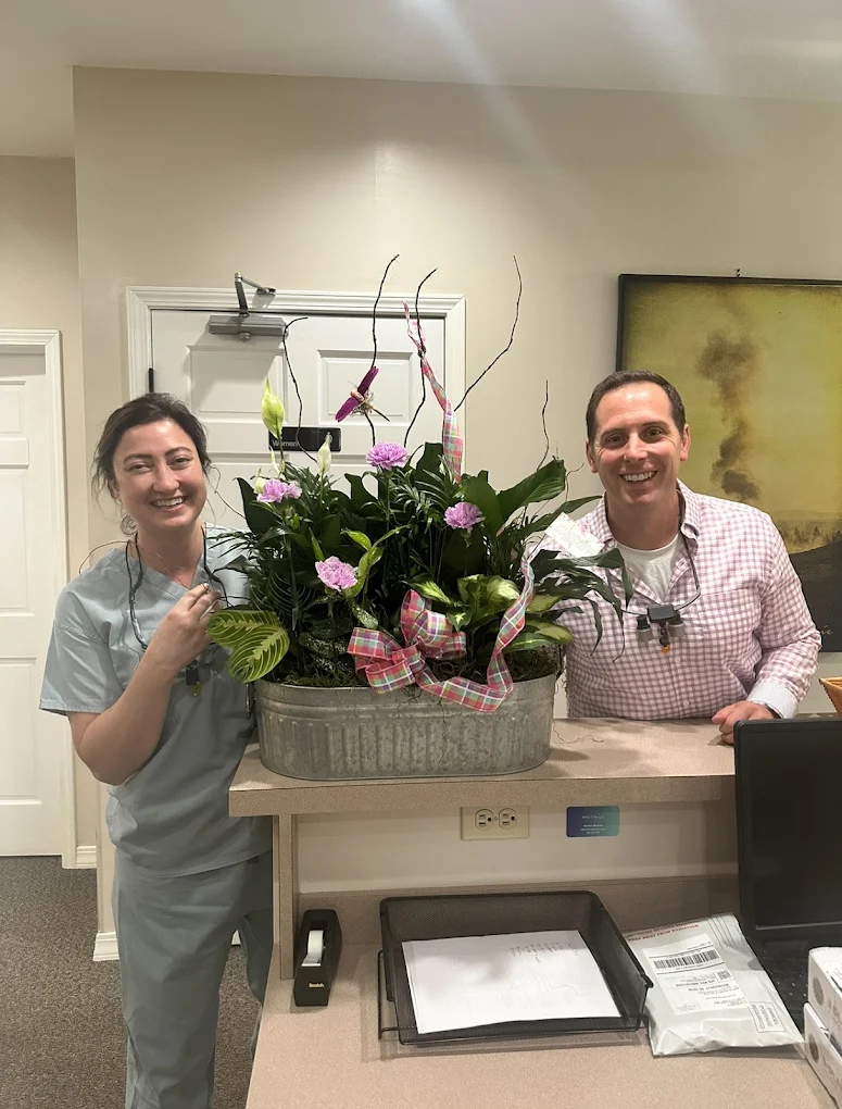 Dr. Serene Nagia and Dr. Andrew Sharman at the front desk